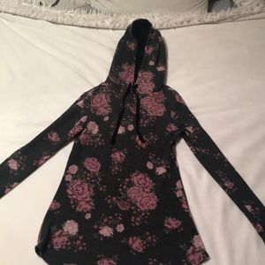 Ultra Flirt sweater with multicolor floral design.